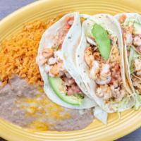 Baja Tacos · Your choice of corn or flour tortilla tacos filled with grilled tilapia, beef batter cod, or...