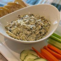 Spinach Artichoke Dip · House-made spinach artichoke dip, served with veggies and crostini.