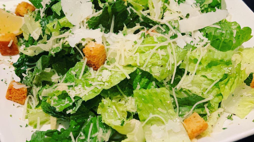 Caesar Salad · Lettuce, Parmesan, pecorino, house made Caesar salad dressing, garlic herb crotons