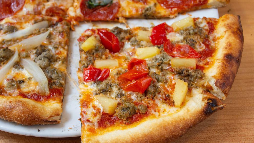 Pizza Dolce Fuoco · House made fresh mozzarella, mama lil's peppers, pineapple, fennel sausage, house made san marzano sauce.
