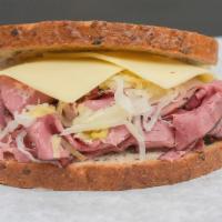 Classic Reuben Sandwich · Swiss cheese, sauerkraut and russian dressing on light rye.