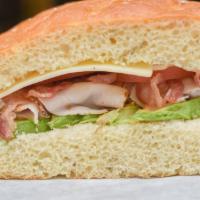 California Dream Sandwich · Oven gold turkey, bacon, avocado, swiss cheese, lettuce, tomato and light mayo on focaccia b...
