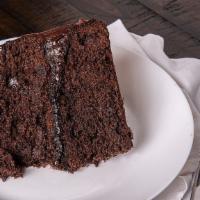 Chocolate Cake · Layers of chocolate cake and Louie's homemade frosting served with a side of vanilla ice cre...
