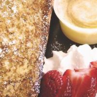 French Toast · 2 slices of French toast with butter, powdered sugar, fruit, whip cream & old fashioned butt...