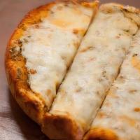 Garlic Cheese Bread · Half a loaf of our Sweet French bread with our homemade Garlic Butter spread, topped with ou...