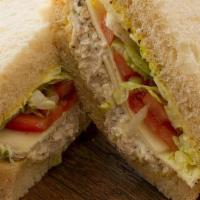 Chicken Salad Sandwich · Served on your choice of bread with our Mayonnaise/Mustard Sauce, Homemade Chicken Salad, Le...
