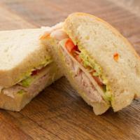 Turkey Breast & Provolone · Served on your choice of bread with our Mayonnaise/Mustard Sauce, Turkey Breast, Lettuce, To...