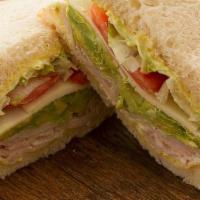 Turkey Breast & Provolone With Avocado · Served on your choice of bread with our Mayonnaise/Mustard Sauce, Turkey Breast, Lettuce, To...