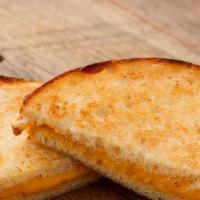 (Kids) Grilled Cheese · Served on our thin-sliced Honey White Bread, Toasted with Butter and Cheddar Cheese.