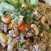 Hawaiian Fried Rice: · Fried rice with chicken & shrimp, egg, pineapples chunks, raisins, cashew nuts, tomatoes, ca...