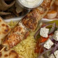 Variety Platter · Greek salad, rice pilaf, gyro meat, pita bread, Tzatziki sauce, chicken and pork skewer or c...