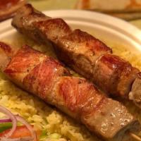 Pork Souvlaki Platter · two skewers of pork with french fries or rice pilaf, pita bread, side salad and drink.