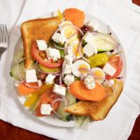 Greek Salad · Lettuce, tomatoes, cucumber, kalamata olives, carrots, pepperoncini, bell peppers, boiled eg...