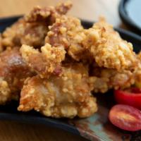 Chicken Kara-Age (Japanese Fried Chicken) · Crispy fried chicken with ponzu and grated radish dipping sauce.