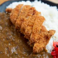 Katsu Curry · Japanese curry and pork cutlet over rice. Curry includes beef and grated onion, carrot, mush...