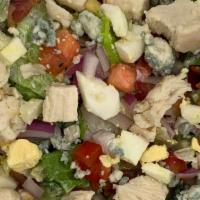 Cobb Salad · Made with our  Chop Chop Mix of Greens, Roasted Chicken or Seasoned Tofu, hard cooked egg, b...