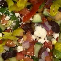 Mediterranean Salad · Made with our  Chop Chop Mix of Greens, Roasted Chicken or Seasoned Tofu, tomato, cucumber, ...