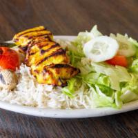 Chicken Kebab Plate · Marinated skinless and boneless chicken breast pieces skewered and grilled to order. Served ...