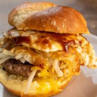 Breakfast Slider · Candied bacon, fried egg, American cheese, hash browns, BBQ, grilled onion.
