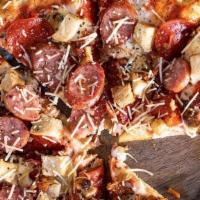 Meat Lovers Pizza · Pepperoni, bacon, andouille sausage, grilled chicken.