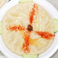 Hummus - Small · Vegan. Choice of plain, roasted red pepper or cilantro jalapeño. Blend of ground chickpeas a...