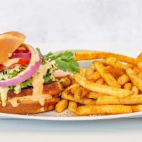 Hot N' Spicy Paneer Burger · Breaded, spicy paneer patty on a toasted Brioche bun. Served with your choice of Fries or a ...