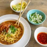 Birria Ramen · Beef or goat meat, noodles, and broth (includes onion, cilantro, and Kymmie's hot oil).