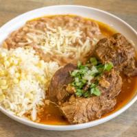 Birria Doña Lidia'S Platter · Beef or goat meat, rice and beans.