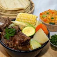 Caldo · A classic hot soup with your choice of tender beef or chicken, carrots, potatoes, corn, etc....