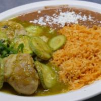 Pollo En Salsa Verde · Two chicken legs and zucchini slices are cooked in a delicious green salsa that comes with r...