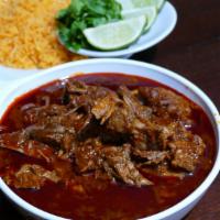 Birria  · Our red stew is made of beef and guajillo chiles and spices. It is accompanied by rice, a si...