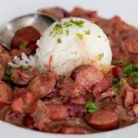 Red Beans & Rice · Spicy. Creamy Camilla Red Beans served over Mahatma Rice.