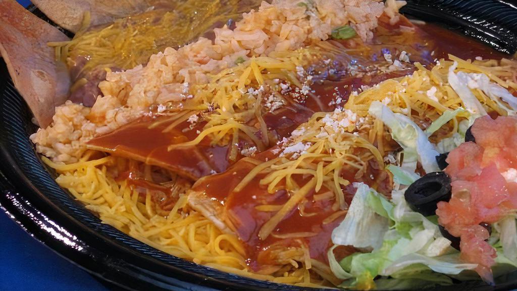 Enchilada (1) · Your choice of cheese, chicken, or beef topped with enchilada sauce and cheese.