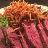 Vip Steak Salad · Mixed greens, grilled steak, tomato, gorgonzola, crispy onion straws and blue cheese dressing.