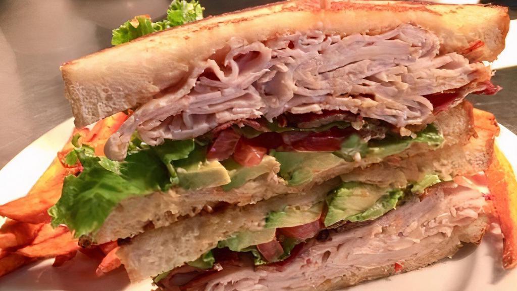 Turkey Club Sandwich · Chipotle or pesto. Choice of spread, bacon, lettuce, tomato, avocado, and sourdough.