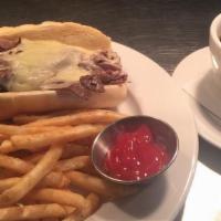 La French Dip · Roast beef, swiss, caramelized onion, au jus and French roll.