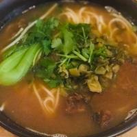 Braised Beef Noodles · Braised beef , sauerkraut ,cilantro, shanghai bok choy