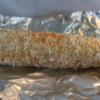 Elote · Freshly made corn with mayonnaise, cotija cheese, and chili powder.
