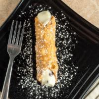 Cannoli · Crispy baked cannoli shells filled with creamy ricotta and mascarpone filling, and chocolate...