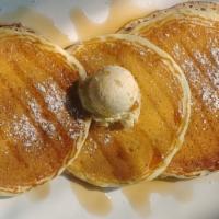 Buttermilk Pancakes · three pancakes with vanilla honey-butter, maple syrup
