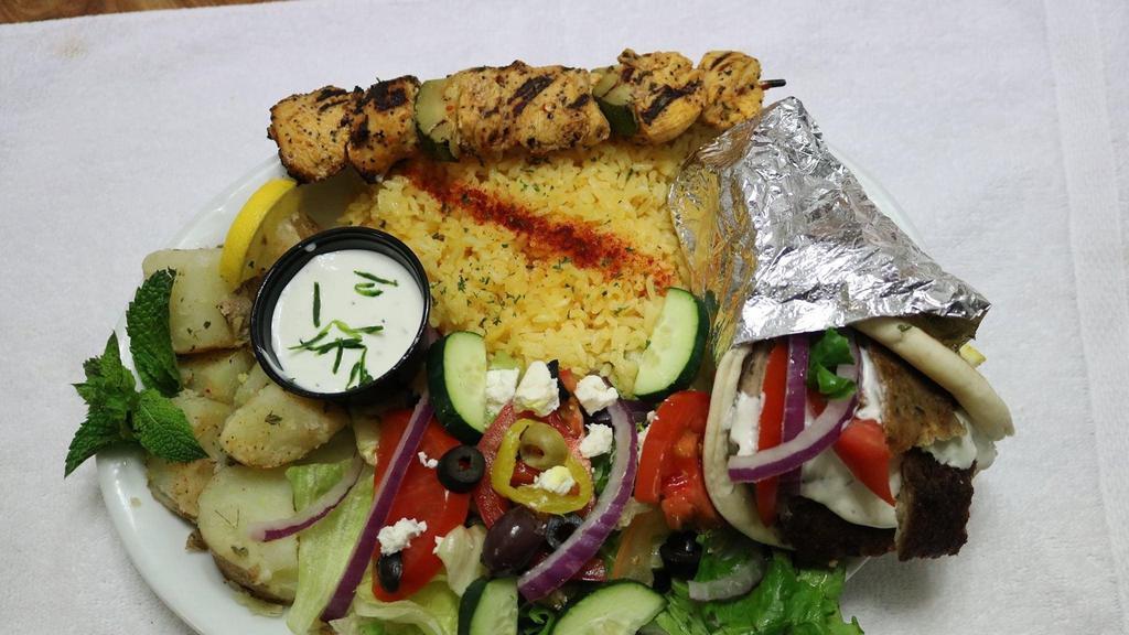 Single Chicken With Gyro · The platters come with lemon rice, potatoes, salad.