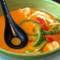 Yellow Curry · Spicy. Your choice of meat, tomatoes onions and Thai basil cooked In yellow coconut curry.