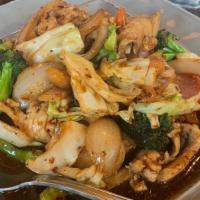 Cashew Chicken · Your choice of meat stir fry with onion, bell peppers, carrots, cabbage, broccoli and cashew...