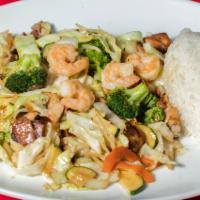 House Stir-Fry · Delicious stir-fried vegetables with chicken, beef, pork, and prawn.