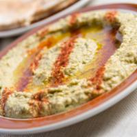 Hummus · Top sellers. Creamy blend of chickpeas, lemon, and garlic, topped with olive oil. Served wit...