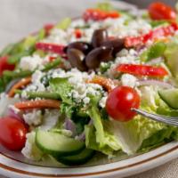 House Salad · Top sellers. Romaine lettuce, tomatoes, cucumbers, red onion, red and green peppers, topped ...