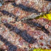 Kefta Kabob Plate · Grilled ground beef patty mixed with onion and parsley.