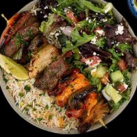 Combo Kabob Plate · Your Choice of Two Kabobs w/ Basmati Rice, Side Salad, Fresh Pita & Your Choice of Sauce.