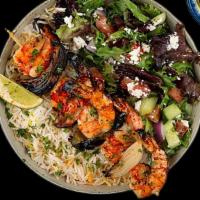 Shrimp Kabob Plate · Tender Charbroiled Shrimp Served w/ Basmati Rice, Side Salad, Fresh Pita & Your Choice of Sa...