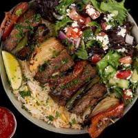 Beef Shawarma Plate · Tender Beef Shawarma Served w/ Basmati Rice, Side Salad, Fresh Pita & Your Choice of Sauce.